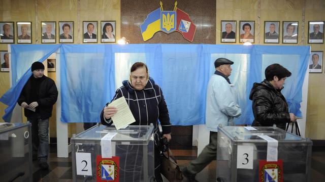 Les habitants de la Crimée doivent choisir entre l'intégration à la Fédération de Russie et une plus large autonomie au sein de l'Ukraine. [AP Photo/Andrew Lubimov]