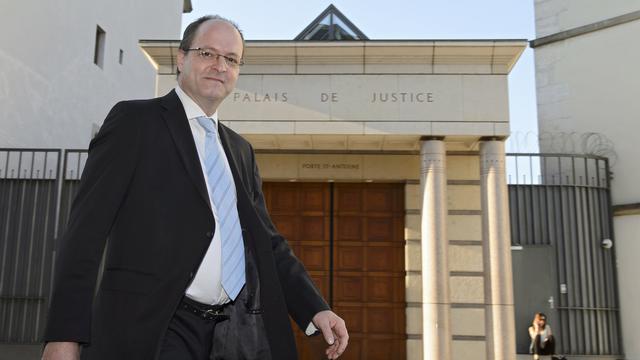 Olivier Jornot, procureur général de la République du canton de Genève, pose devant le Palais de Justice le 13 avril 2014. [/Martial Trezzini]