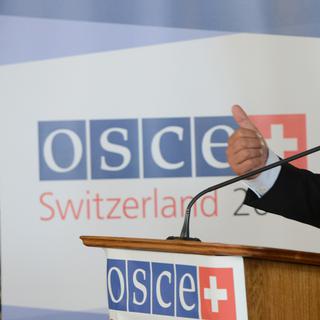 Didier Burkhalter lors d'une conférence de presse pour l'OSCE en 2014 à Prague. [AFP - Michal Cizek]
