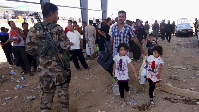 De nombreux chrétiens ont déjà fui les régions de Bagdad et de Mossoul pour se réfugier au Kurdistan irakien. [AP/Keystone]