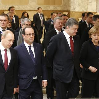 Le président russe Vladimir Poutine (gauche) et ses homologues français, François Hollande, ukrainien, Petro Poroshenko, et allemand, Angela Merkel. [Reuters - Vasily Fedosenko]