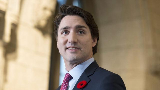 Justin Trudeau avait fait de l'accueil de réfugiés syriens une de ses promesses de campagne [Adrian Wyld/The Canadian Press via AP]