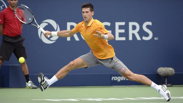 A la peine contre Gulbis la veille, Djokovic a retrouvé ses sensations face à Chardy. [Keystone - Paul Chiasson]