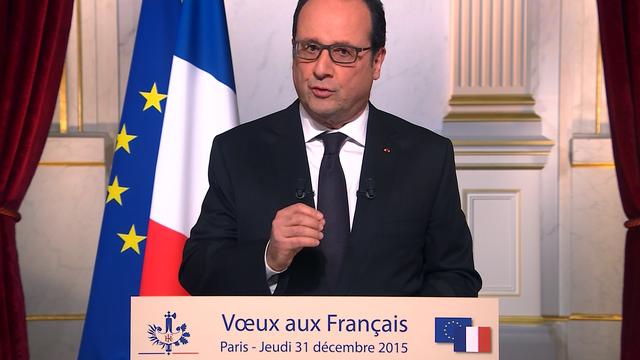 "2015 fut une année de souffrance et de résistance. Alors faisons de 2016 une année de vaillance et d'espérance", a conclu François Hollande, lors de son allocution télévisée. [AFP - Stringer]