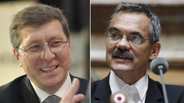 Mauro Poggia (gauche) et Jean-François Steiert. [Keystone - Martial Trezzini/Peter Klaunzer]