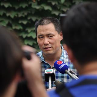 Emblématique défenseur des droits civils, Pu Zhiqiang a notamment défendu devant la justice des victimes de camps de rééducation par le travail, le célèbre artiste Ai Weiwei. [AFP - Ed Jones]