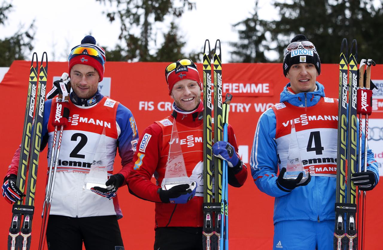 Martin Johnsrud Sundby (centre) réalise une saison parfaite. [REUTERS - Alessandro Garofalo]