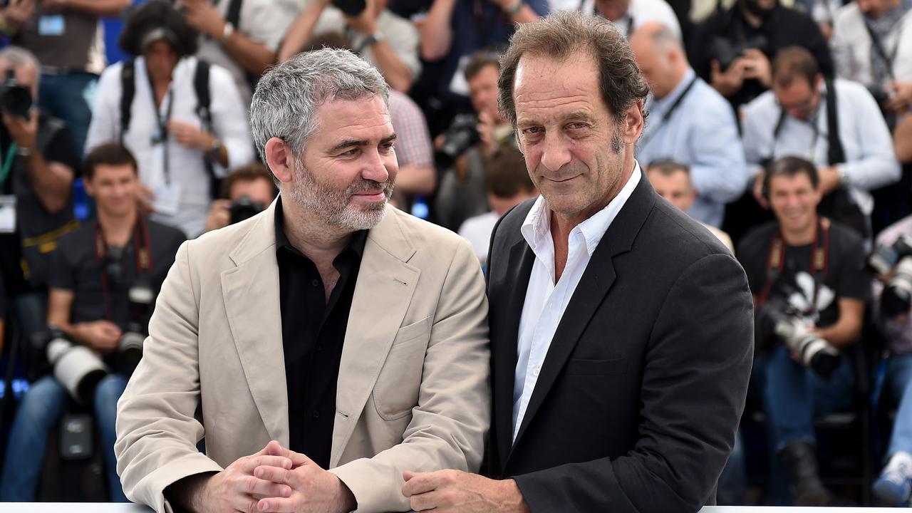 Le réalisateur Stéphane Brizé et l'acteur français Vincent Lindon, Prix dʹinterprétation masculine pour "La loi du marché". [AFP - Anne-Christine Poujoulat]