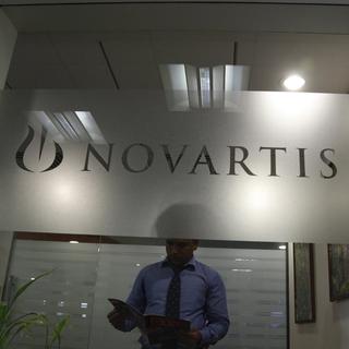 La Suisse est accusée de faire du lobbying notamment en faveur de Novartis. [EPA/Keystone - Divyakant Solanki]