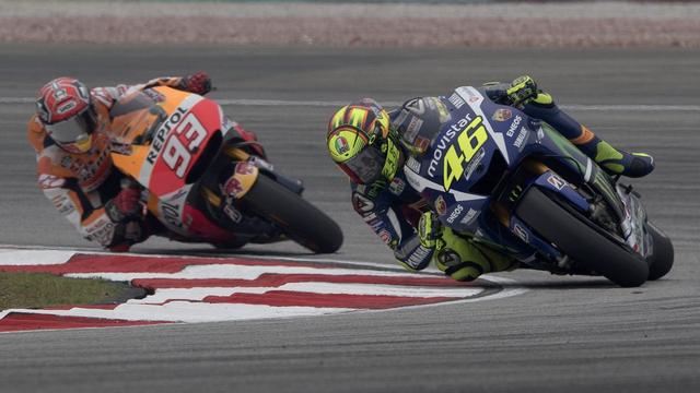 Valentino Rossi (46) et Marc Marquez (93) ont eu un accrochage en Malaisie. [EPA/Ahmad Yusni]