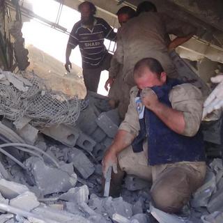 Ruines dans la ville syrienne de Talbiseh après un raid aérien mené le 30 septembre [Syria Civil Defence via AP]