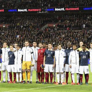 17 novembre, Wembley: l'émotion est à son comble juste avant le coup d'envoi d'Angleterre-France. Quatre jours après les attentats de Paris, "La Marseillaise" est reprise en choeur par les 80'000 spectateurs. [Facundo Arrizabalaga]