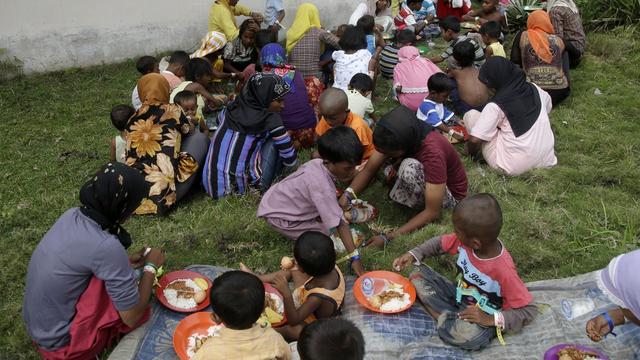 Des migrants Rohingya, minorité musulmane de Birmanie, en Indonésie. [Keystone - Tatan Syuflana - AP Photo]