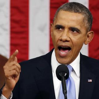 Barack Obama. [AP Photo/Keystone - Larry Downing]