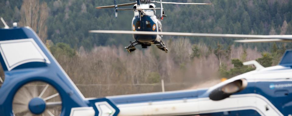 Les hélicoptères ont repris leurs opérations mercredi matin. [DPA/AFP - Peter Kneffel]