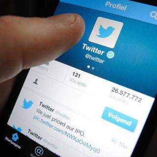 Twitter autorise les messages privés à dépasser les 140 caractères. [EPA/Keystone - Lex Van Lieshout]