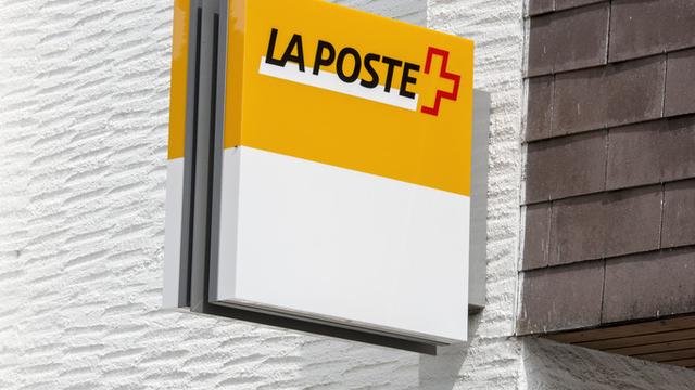 Enseigne de La Poste. [Keystone - Christian Beutler]