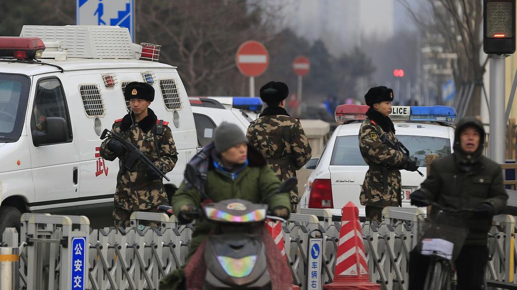 La Chine adopte une loi antiterroriste. [key - AP Photo/Andy Wong]