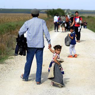 Migrants sur la route des Balkans. [EPA/Keystone - Davor Stojnek]