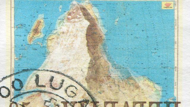 Un timbre représentant le Cervin en surimpression d'une carte inversée de l'Afrique.
rook76
Fotolia [rook76]