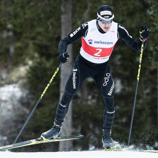 Dario Cologna lors d'un entraînement à Davos en novembre 2015. [Keystone - Gian Ehrenzeller]
