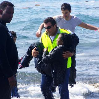 Les migrants arrivent sur l'île grecque de Rhodes. [Eurokinissi/AP/Keystone - Argiris Mantikos]