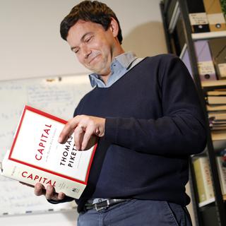 Le livre de Thomas Piketty s'est vendu comme des petits pains malgré ses 900 pages. [Charles Platiau]