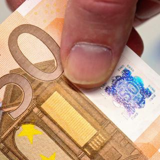 L'euro a été mis en circulation en 2002. [Keystone/EPA - Boris Rössler]