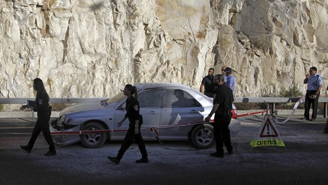 Une Palestinienne a fait exploser une charge dans sa voiture lors d’un contrôle policier près de Jérusalem. [AP Photo/Keystone - Mahmoud Illean]