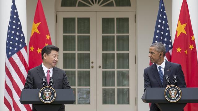 Xi Jinping et Barack Obama lors de leur conférence de presse devant la Maison Blanche. [EPA/Keystone - Michael Reynolds]