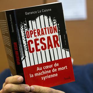 "César" est un ex-photographe du service de documentation de la police militaire syrienne. [AFP - Florian David]