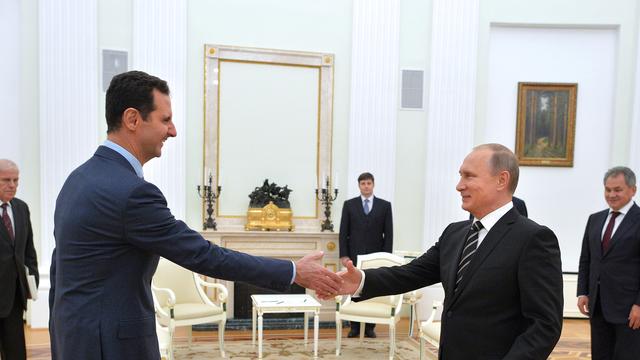 Bachar al-Assad et Vladimir Poutine ont discuté des frappes aériennes russes en Syrie. [AFP/Ria Novosti - Alexey Druzhinin]