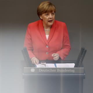 Angela Merkel a tenté de convaincre les parlementaires allemands avant leur vote. [Axel Schmidt]