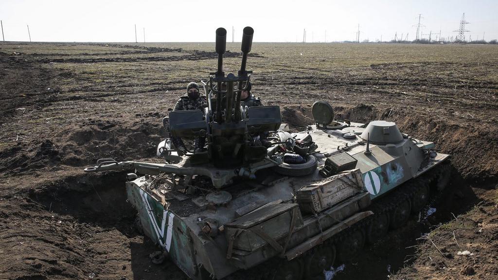 L'Ukraine affirme avoir retiré ses armes lourdes de la ligne de front dans l'Est. [EPA/Keystone]