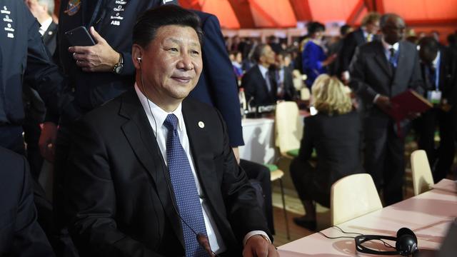 Le président chinois Xi Jinping lors de l'ouverture de la COP21, lundi. [Pool/AP/Keystone - Eric Feferberg]