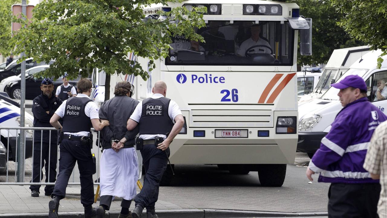 Une arrestation d'un membre du groupe Sharia4Belgium en 2012 dans la commune de Molenbeek-Saint-Jean.