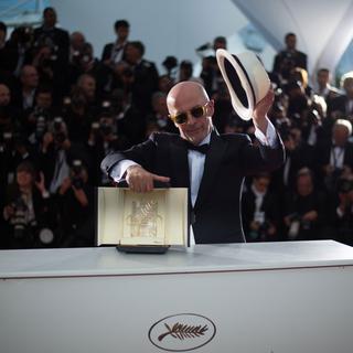 Le réalisateur français Jacques Audiard a reçu la Palme d'or pour son film "Dheepan". [AFP - Bertrand Langlois]