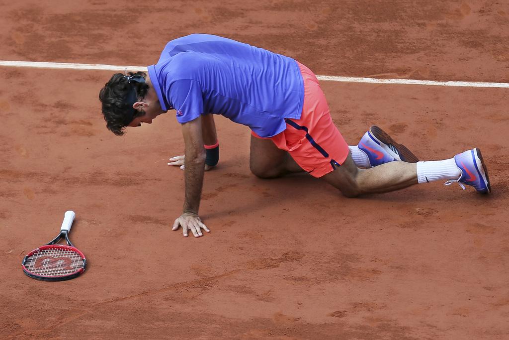 Federer est littéralement tombé à terre sous les coups de massue de Wawrinka [KEYSTONE - David Vincent]