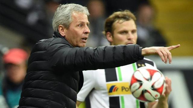 Si certains en doutaient, Favre (à gauche) se plaît bel et bien à Gladbach. [Arne Dedert]