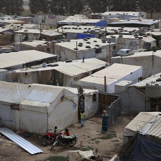 Un camp de réfugiés syriens près de la ville de Deir Zanoun, au Liban. [AP Photo/Bilal Hussein]