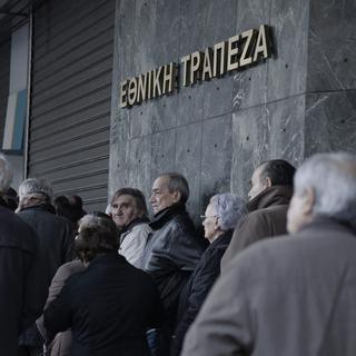 Les Grecs retirent dans le calme leur argent. [key - AP Photo/Petros Giannakouris]