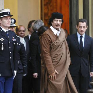 Quand l'ex-président français Nicolas Sarkozy recevait Kadhafi à l'Elysée, le 10 décembre 2007. [AFP - FRANCK FIFE]