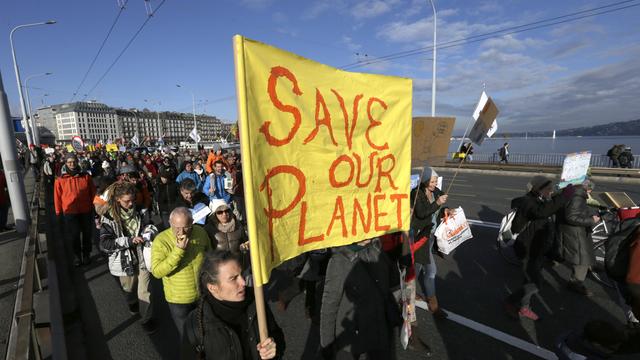 La Conférence de l'ONU sur le climat de Paris (COP21) a déjà commencé dans les rues genevoises. [Salvatore Di Nolfi]