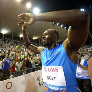 Usain Bolt à Lausanne en 2012. [Keystone - Jean-Christophe Bott]