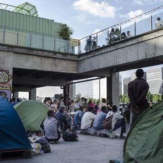 Les migrants installés à Paris. [EPA/Keystone - Yoan Valat]