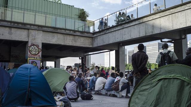 Les migrants installés à Paris. [EPA/Keystone - Yoan Valat]