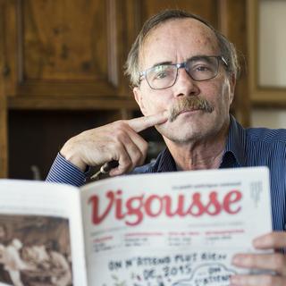 Thierry Barrigue, rédacteur en chef de Vigousse, photographié chez lui en janvier 2015. [KEYSTONE - Jean-Christophe Bott]