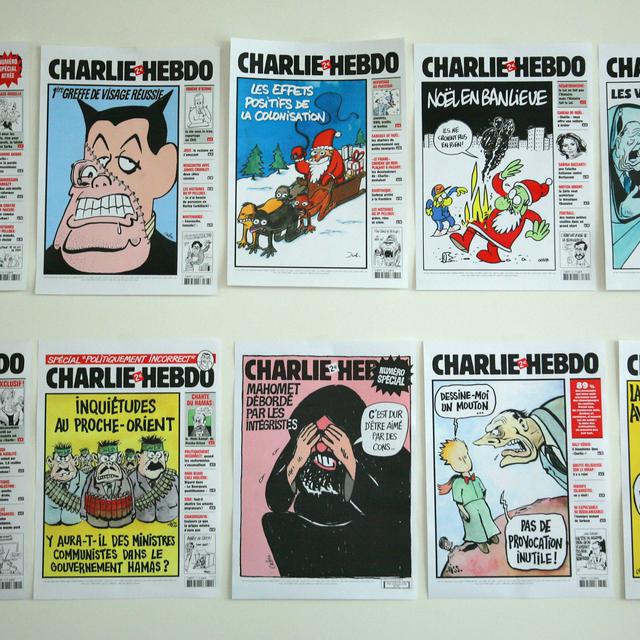 Des couvertures du journal satirique Charlie Hebdo. [AFP - Joel Saget]