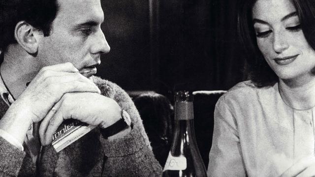 Jean-Louis Trintignant et Anouk Aimée dans "Un homme et une femme" de Claude Lelouch (1966). [Films 13 / The Kobal Collection/ AFP]