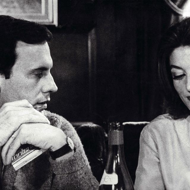 Jean-Louis Trintignant et Anouk Aimée dans "Un homme et une femme" de Claude Lelouch (1966). [Films 13 / The Kobal Collection/ AFP]